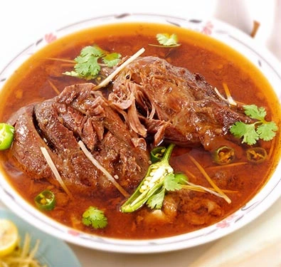 Delicious Nihari slow-cooked beef stew at Taste of Pakistan in Edmonton, AB